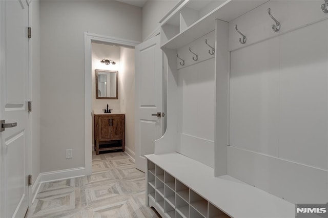 mudroom featuring sink