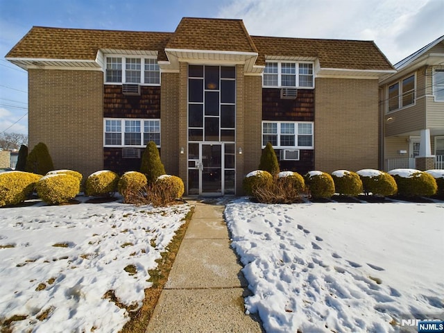 view of snow covered building