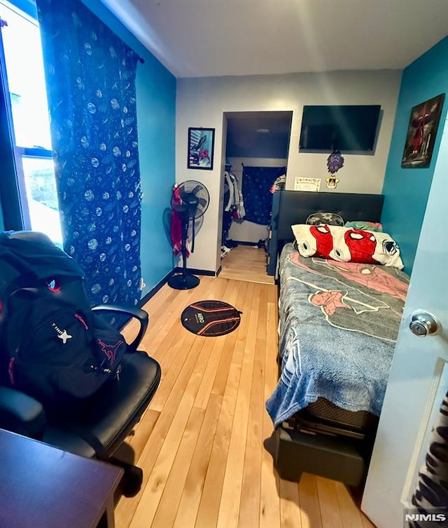 bedroom featuring hardwood / wood-style flooring