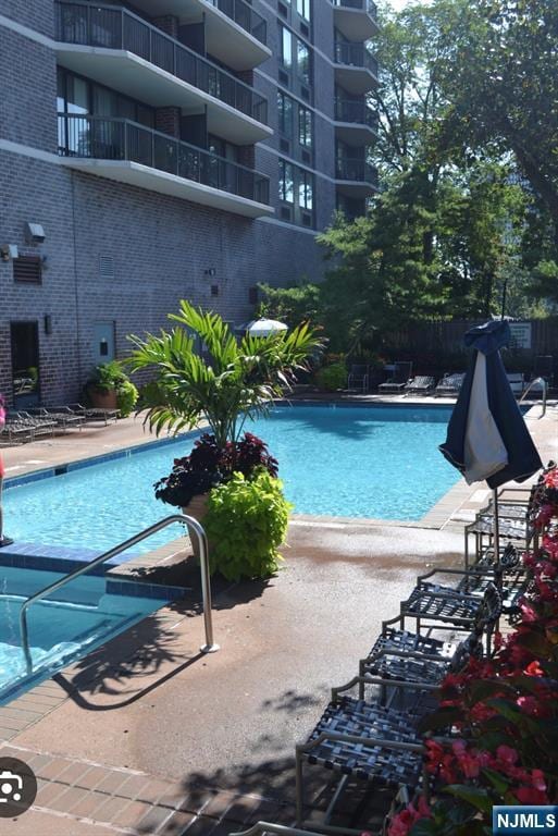 view of pool with a patio