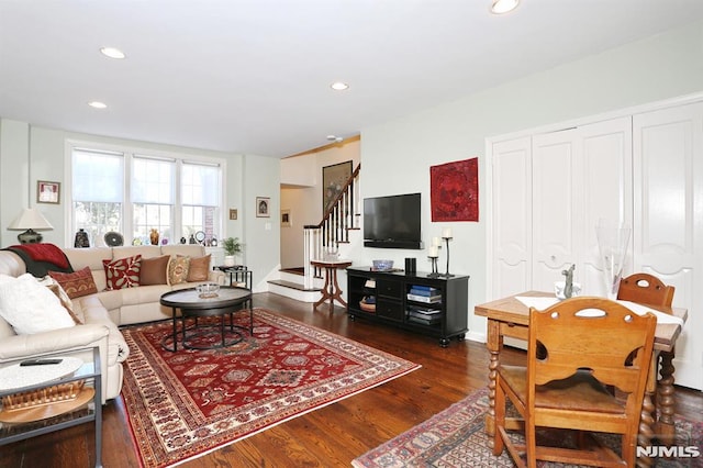 living room featuring dark hardwood / wood-style floors