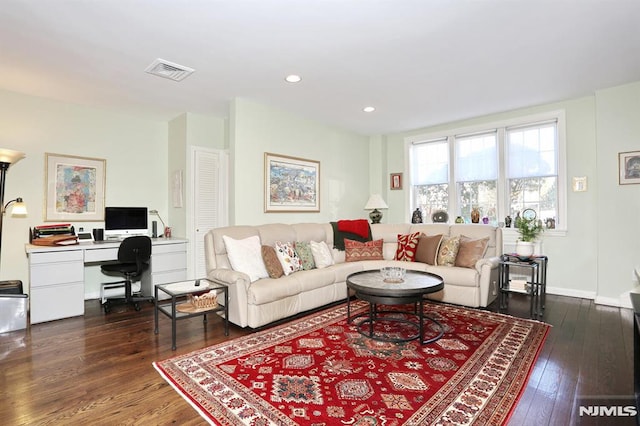 living room with dark wood-type flooring