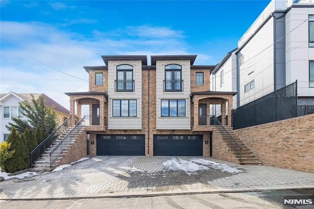 view of front of home with a garage