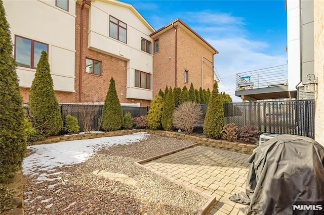 view of patio / terrace featuring a grill