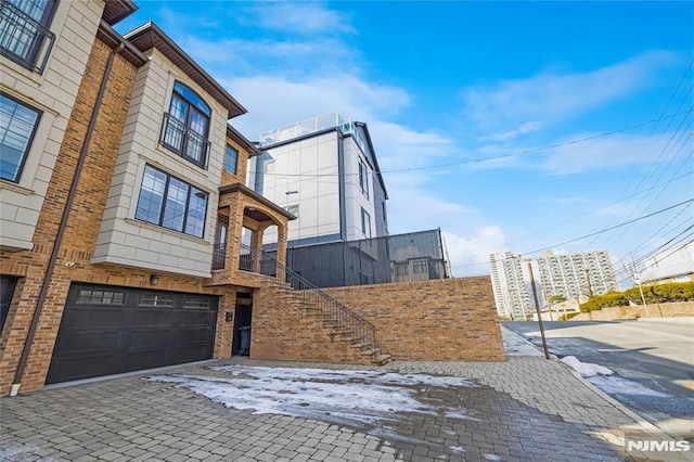 exterior space with a garage