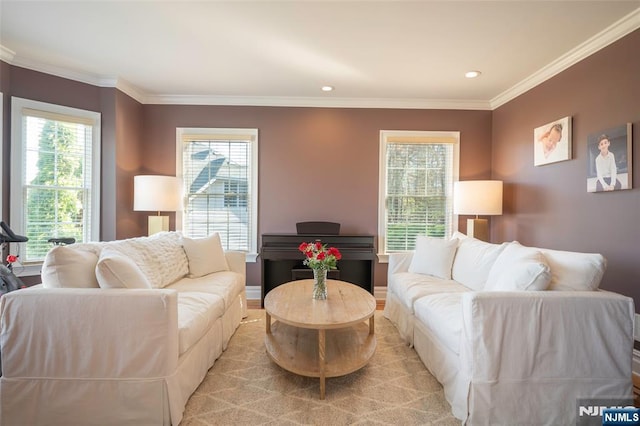 living room with recessed lighting, a healthy amount of sunlight, and crown molding