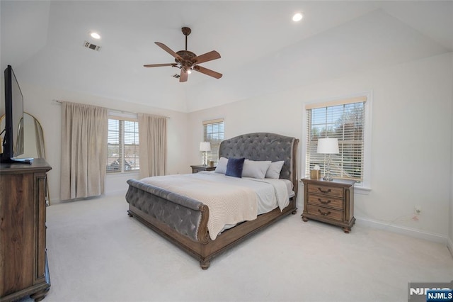 bedroom with recessed lighting, visible vents, vaulted ceiling, and light carpet