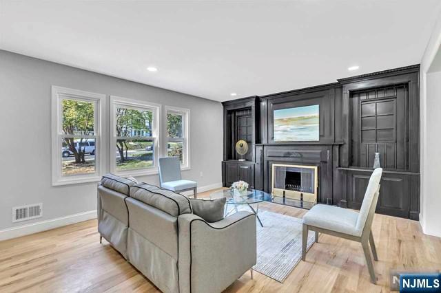 living room featuring light wood-type flooring