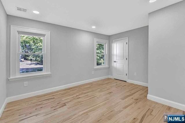 empty room featuring light wood-type flooring