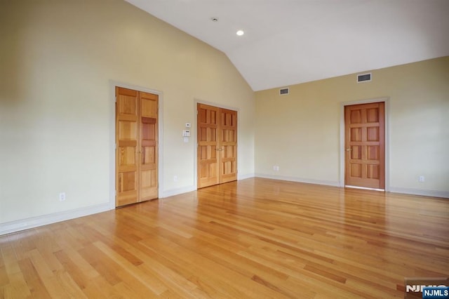 unfurnished room with light wood-type flooring