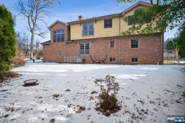 view of snow covered property