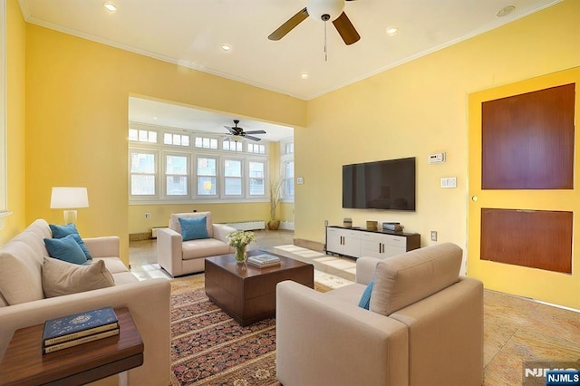 living room featuring crown molding and ceiling fan