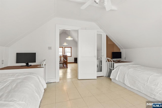 bedroom with lofted ceiling and ceiling fan