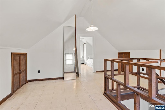 bonus room featuring vaulted ceiling