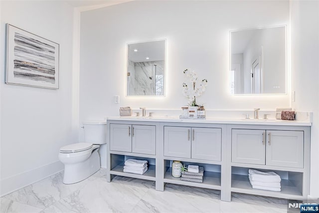 bathroom with vanity, a shower, and toilet