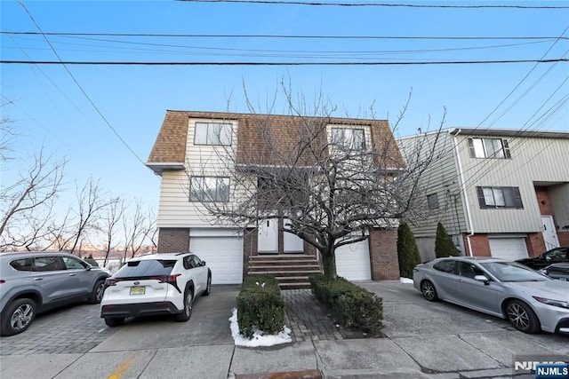 view of property featuring a garage