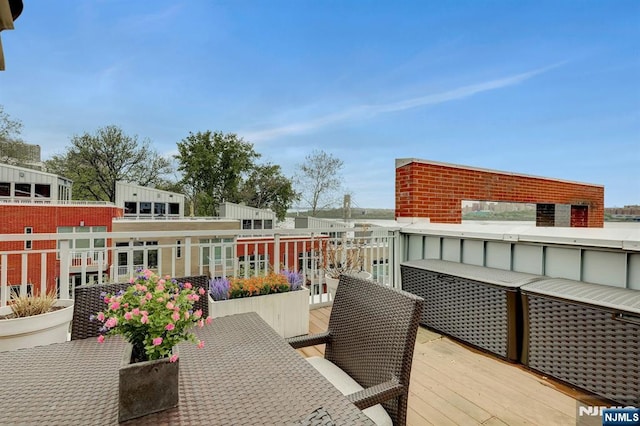 wooden terrace featuring an outdoor hangout area