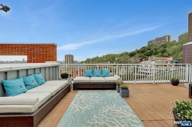 deck with an outdoor hangout area