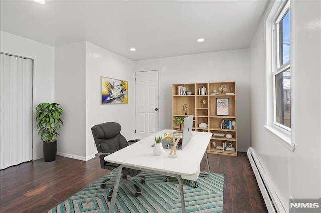 home office featuring a baseboard radiator and dark wood-type flooring