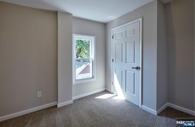 view of carpeted spare room