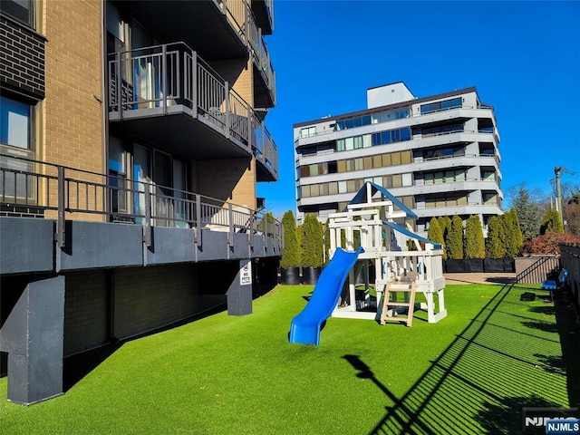 view of play area with a lawn