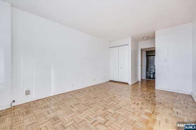 unfurnished room featuring light parquet floors