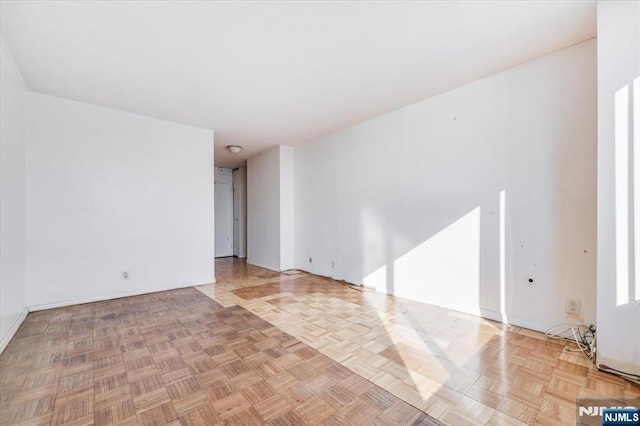 empty room featuring light parquet flooring