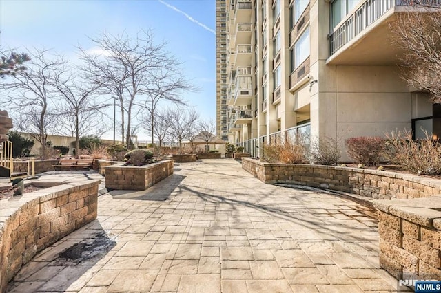 view of home's community with a patio