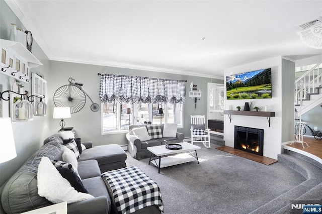 living room with carpet floors and ornamental molding