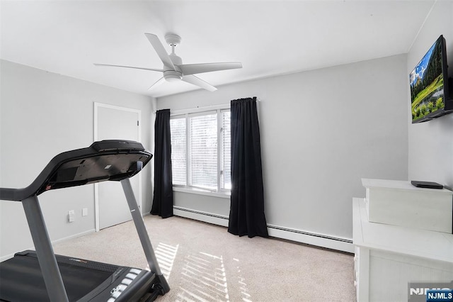 exercise room featuring ceiling fan and light carpet