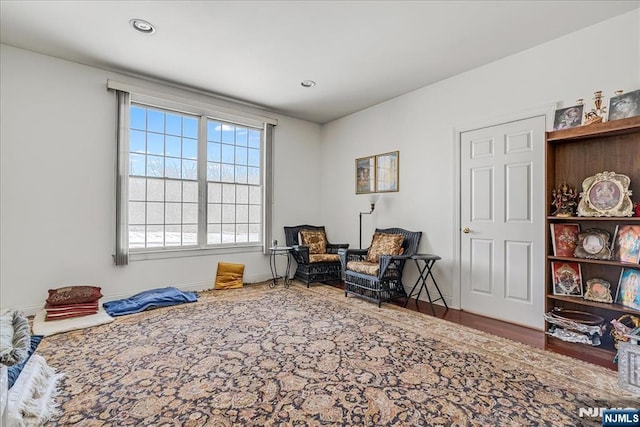 living area featuring hardwood / wood-style flooring