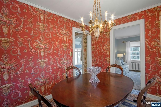 dining area with radiator, crown molding, and a chandelier