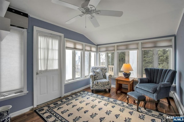 sunroom with a baseboard radiator, lofted ceiling, a wealth of natural light, and ceiling fan