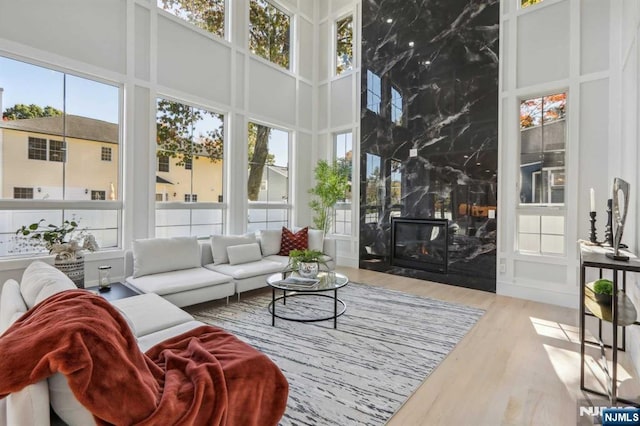 sunroom with a fireplace