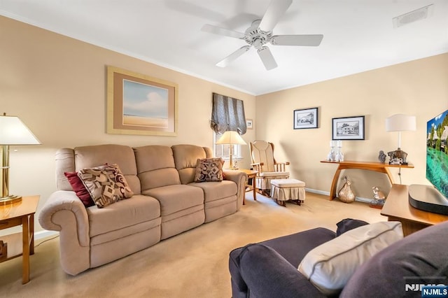 living room with carpet and ceiling fan