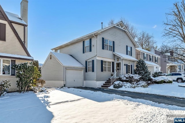 view of property with a garage