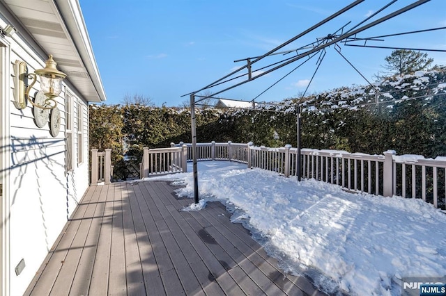 view of snow covered deck