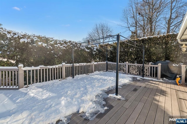 view of snow covered deck