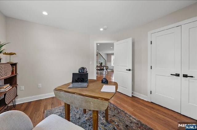 office space featuring hardwood / wood-style floors