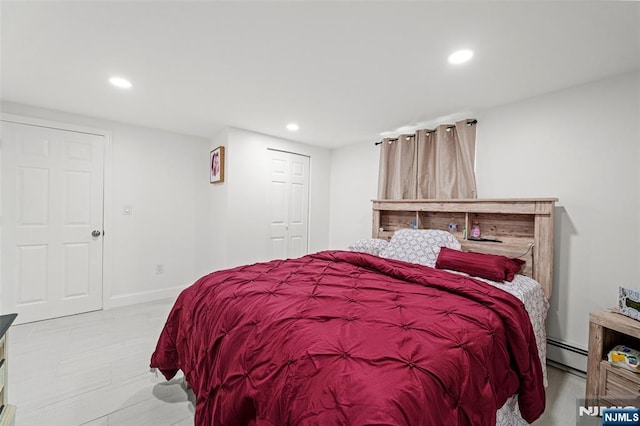 bedroom with a baseboard radiator