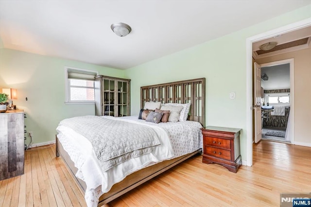 bedroom with wood-type flooring