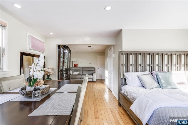 bedroom with light hardwood / wood-style flooring