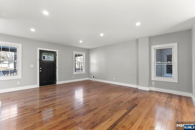 interior space with hardwood / wood-style floors