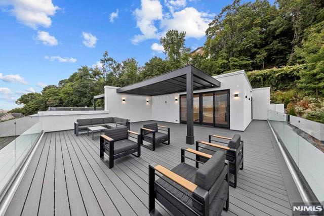 wooden deck with an outdoor hangout area