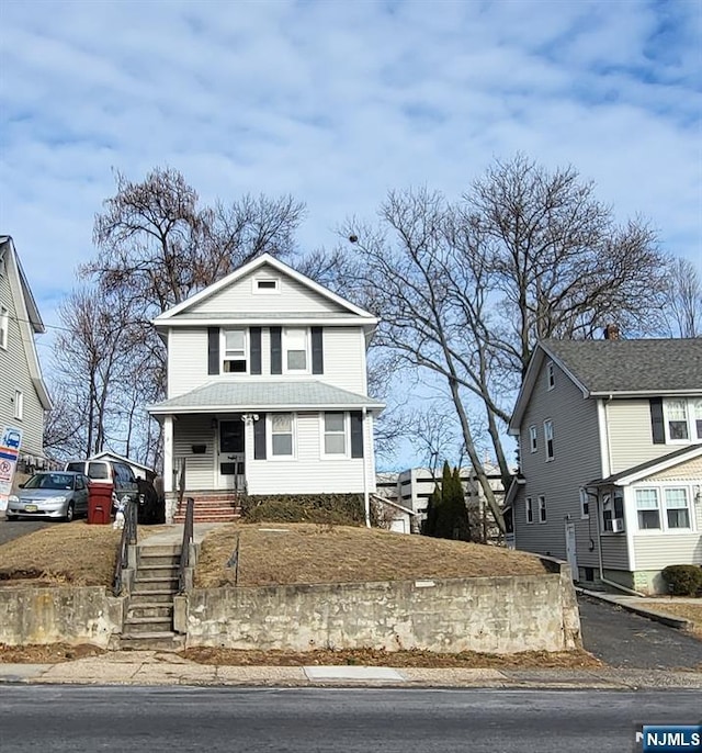 view of front property with covered porch