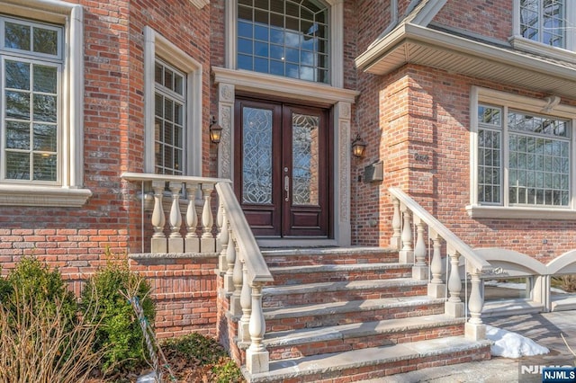 doorway to property featuring french doors