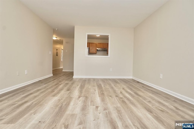 empty room featuring light hardwood / wood-style floors