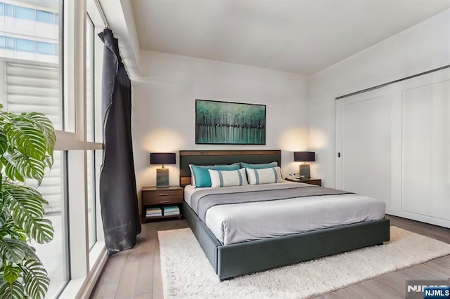 bedroom featuring hardwood / wood-style floors