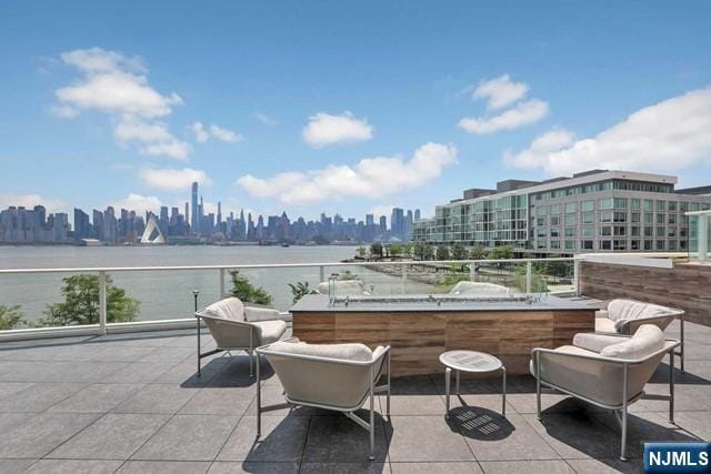 view of patio / terrace featuring a water view