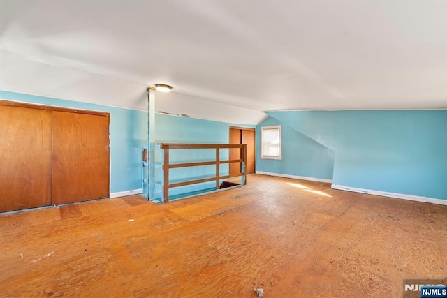 bonus room with lofted ceiling